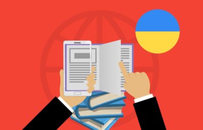 Czytanie otwartej książki z flagą Ukrainy.