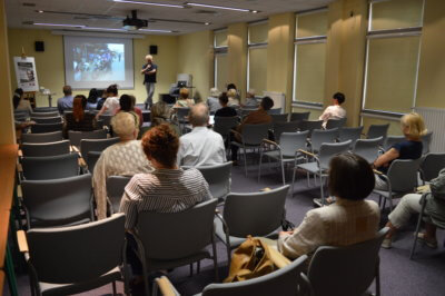 Uczestnicy spotkania na sali konferencyjnej.