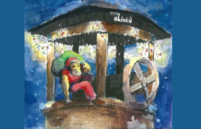 Mikołaj z workiem na plecach wychodzi ze studni