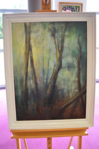 Obraz Henryka Filipczaka przedstawiający las w wodzie.