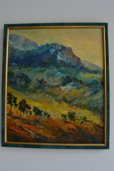 Obraz Henryka Filipczaka przedstawiający górzystyt krajobraz.